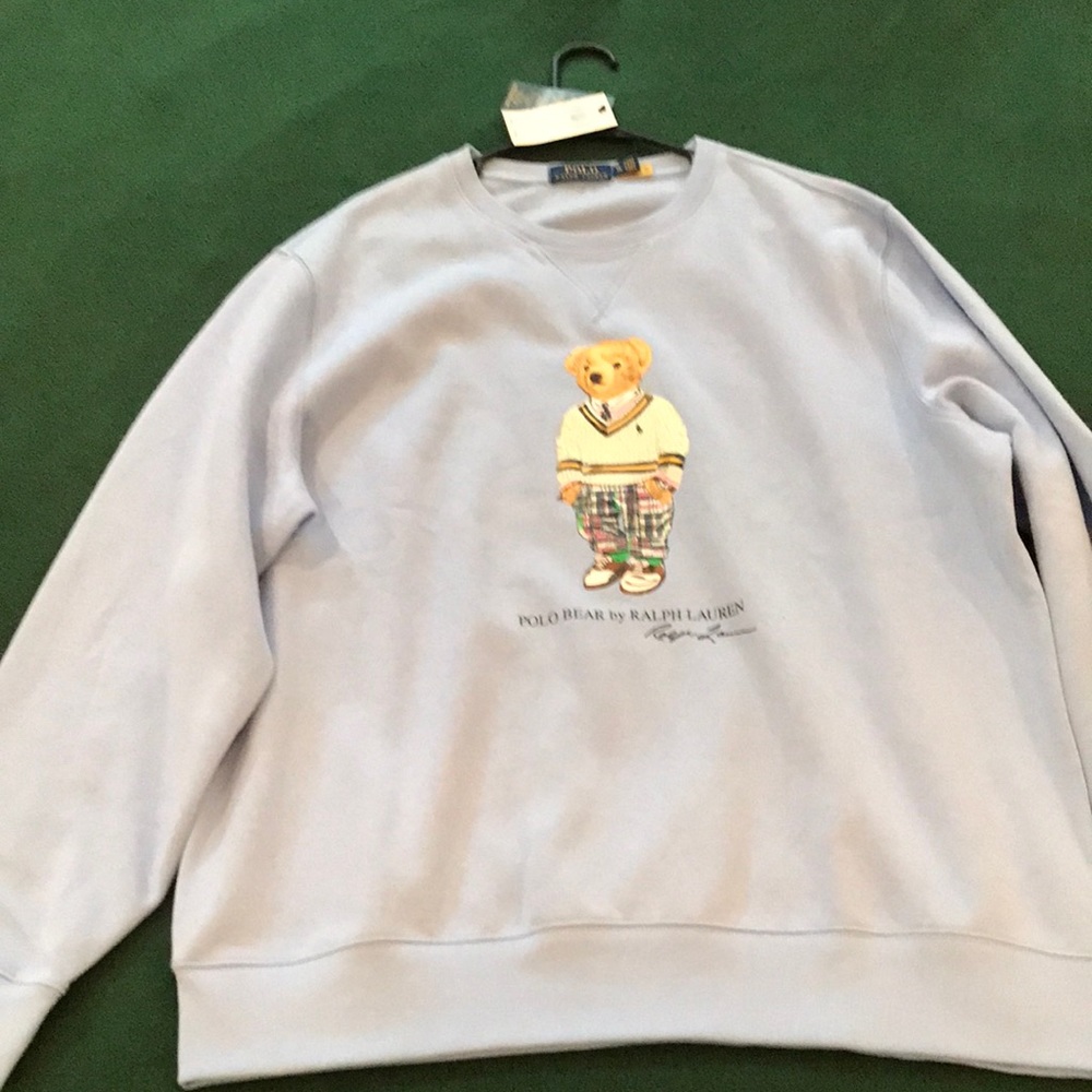 Light blue polo sweater by Ralph Lauren. Brand new. Original $168.00